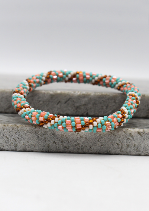 Turquoise Pink Spiral White  Nepalese Roll on Beads Bracelet