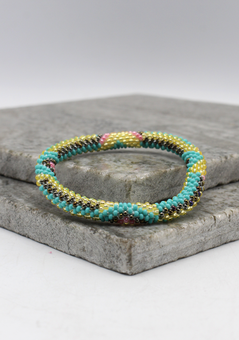 Anaconda Color   Nepalese Roll on Beads Bracelet