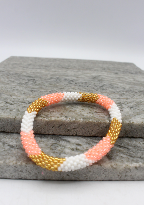 Baby Pink Three Stripe Nepalese Roll on Beads Bracelet