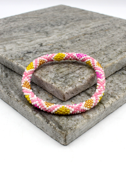 Gold Pink Nepalese Roll on Beads Bracelet