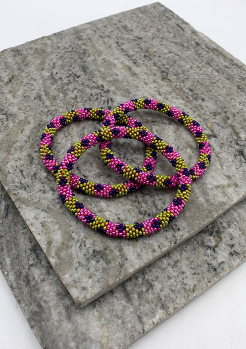 Pink Green Two Lines Nepalese Roll on Beads Bracelet