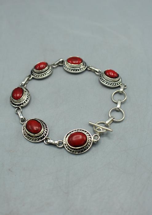 Coral Inlaid Oval White Metal Bracelet