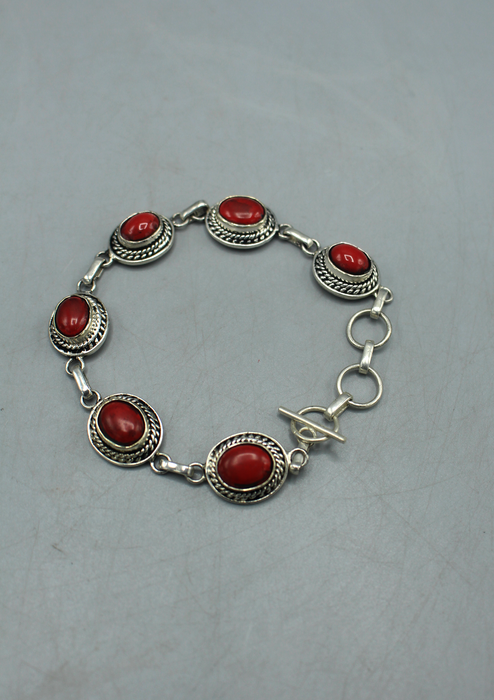 Coral Inlaid Oval White Metal Bracelet
