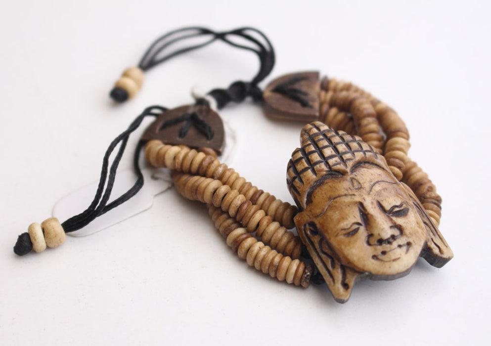 Buddha Face Carved Bone Bracelet