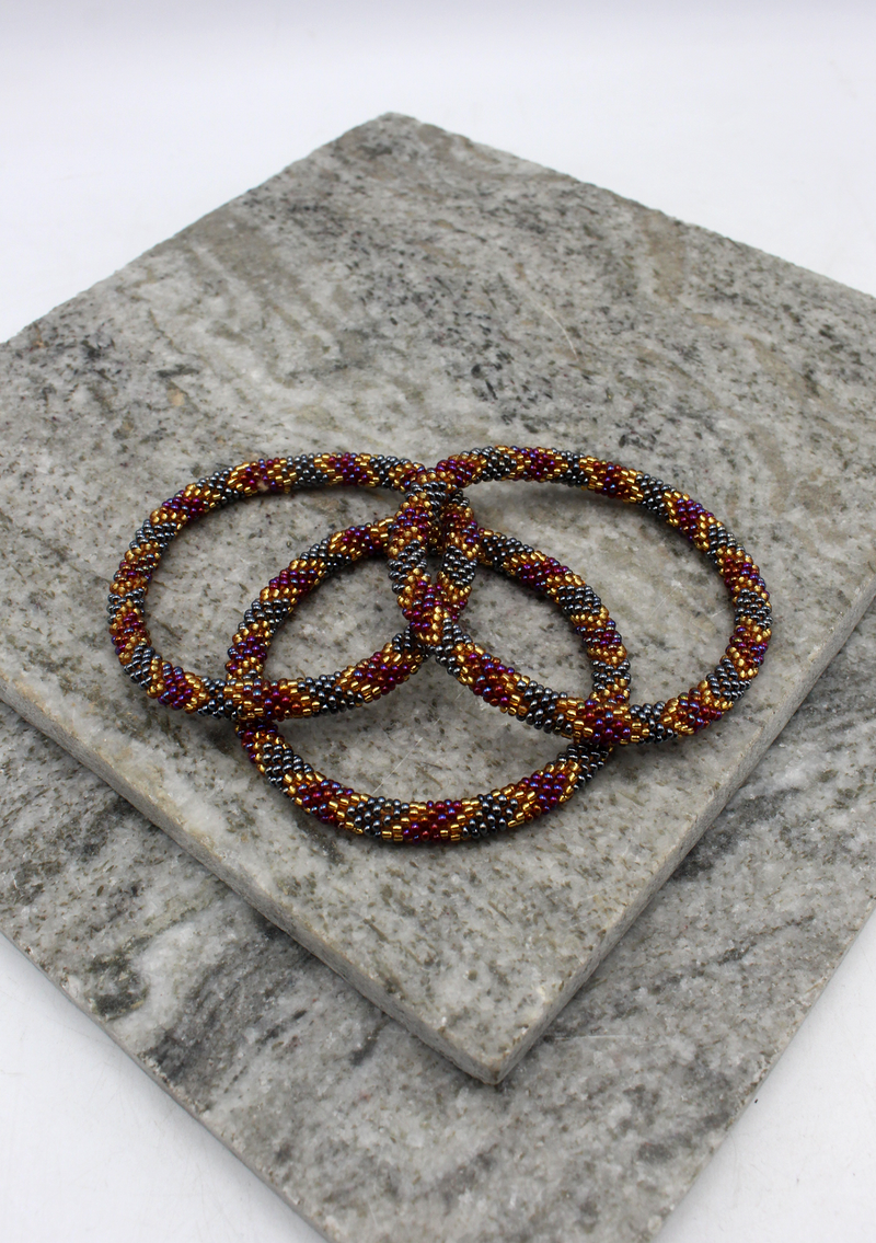 Dark Purple, Gold & Mixed Beads Nepalese Roll on Bracelet