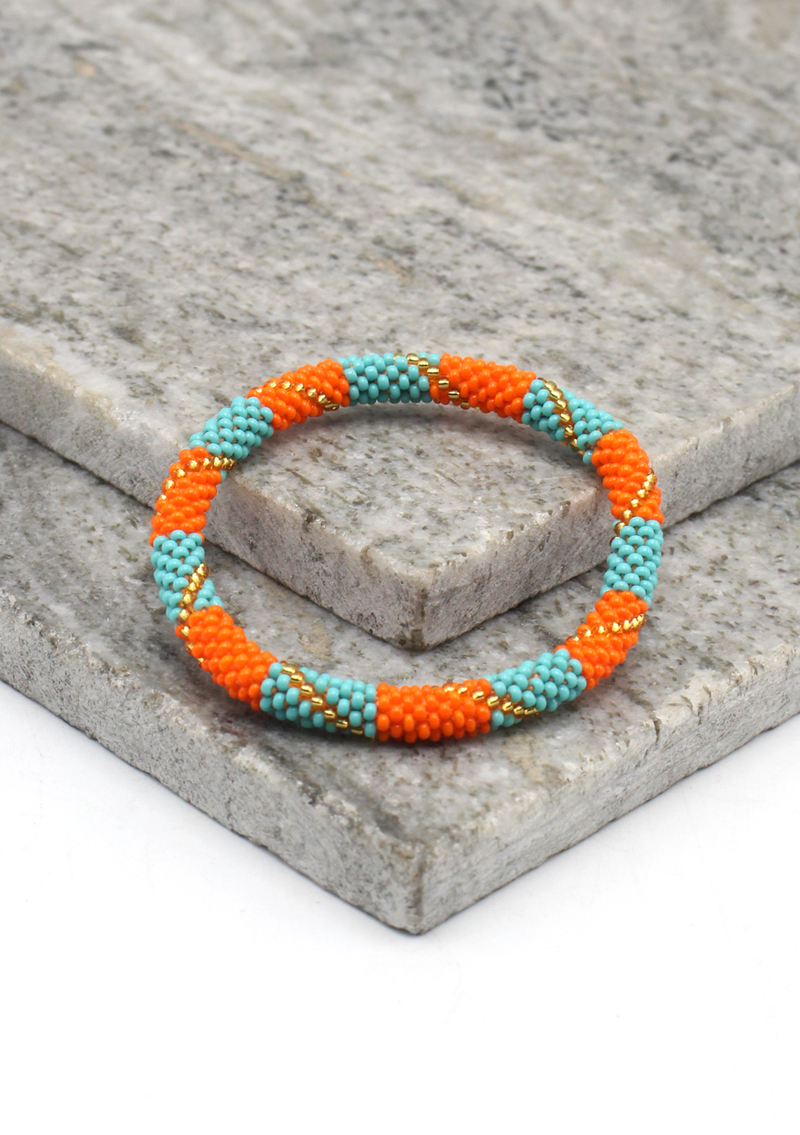 Orange Turquoise   Nepalese Roll on Beads Bracelet