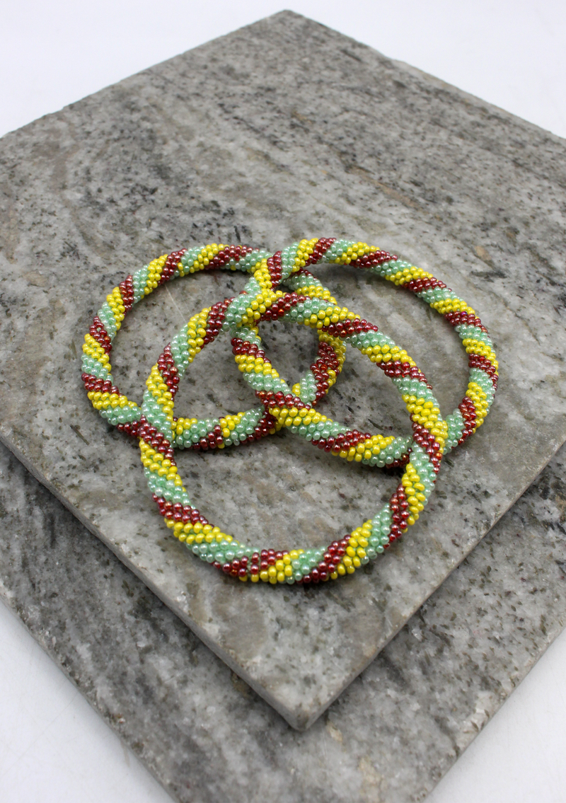 Mint Green  and Yellow Spiral Nepalese Roll on Beads Bracelet