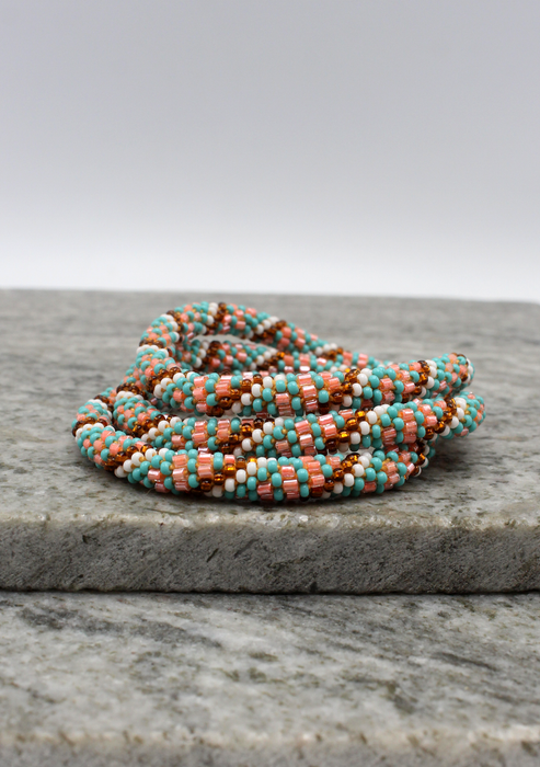 Turquoise Pink Spiral White  Nepalese Roll on Beads Bracelet