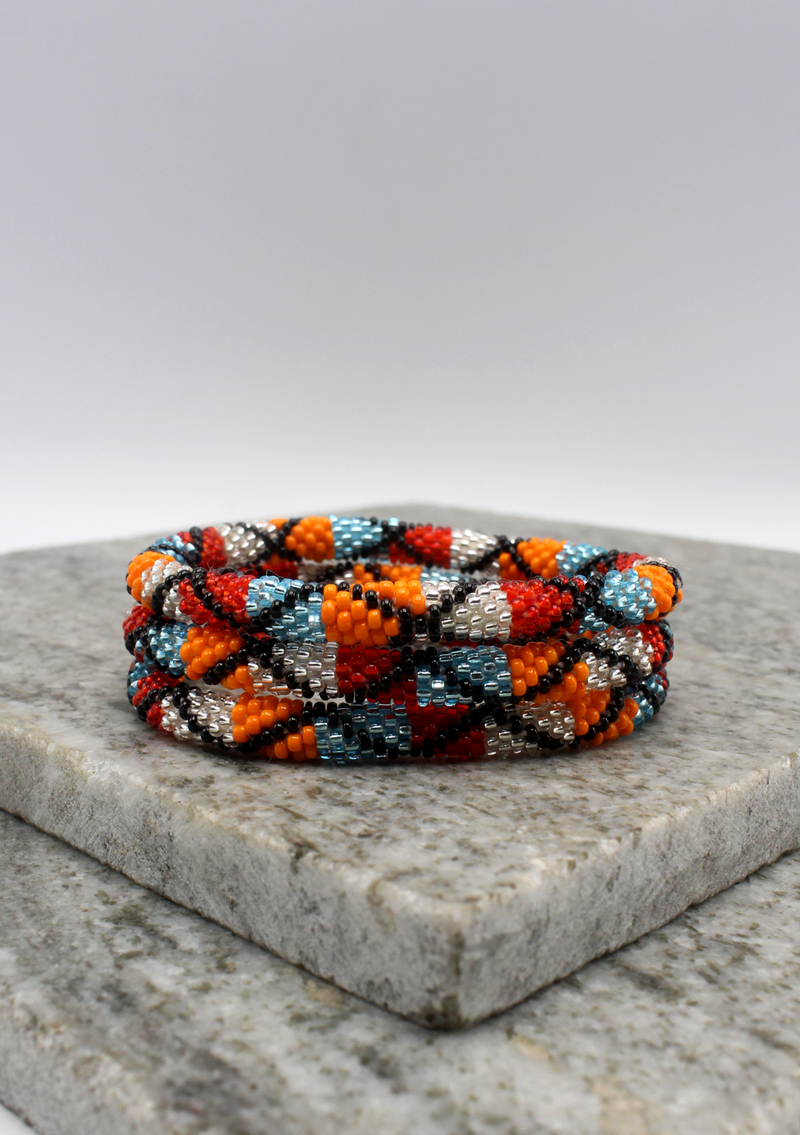 Orange Silver Red  Nepalese Roll on Beads Bracelet