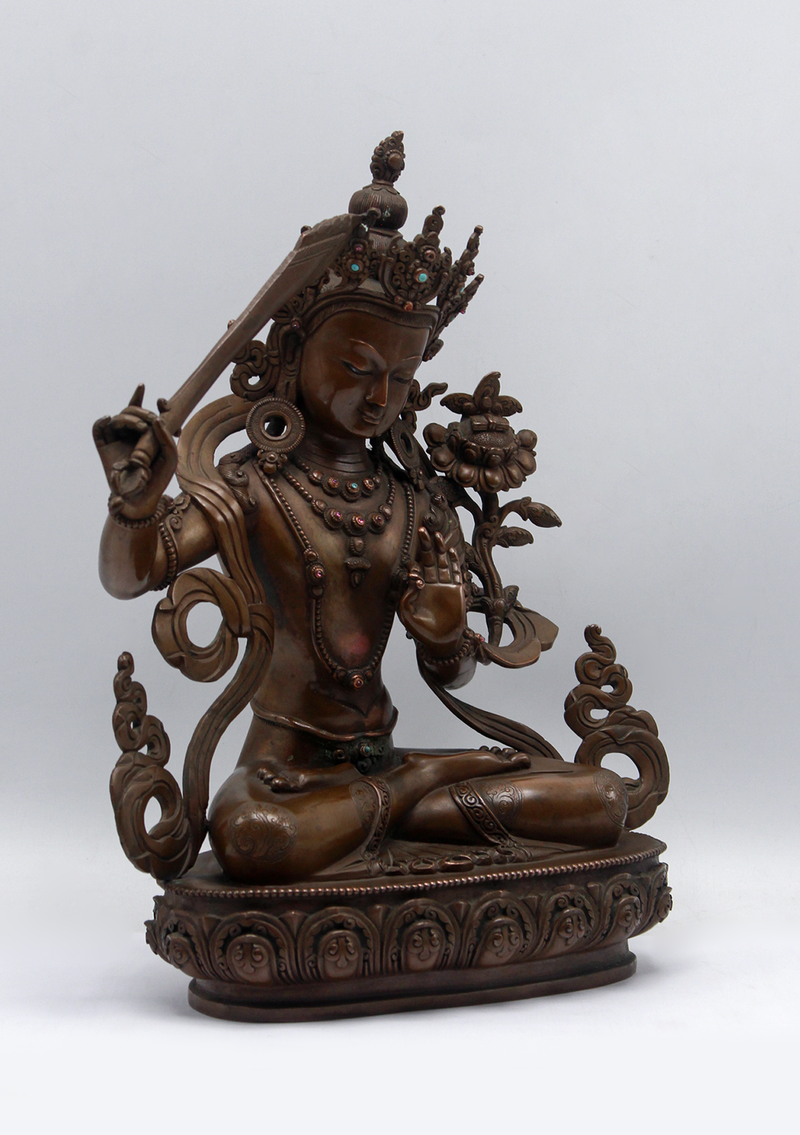 Masterfully Handcrafted Oxidized Copper Manjushri Statue – 11”