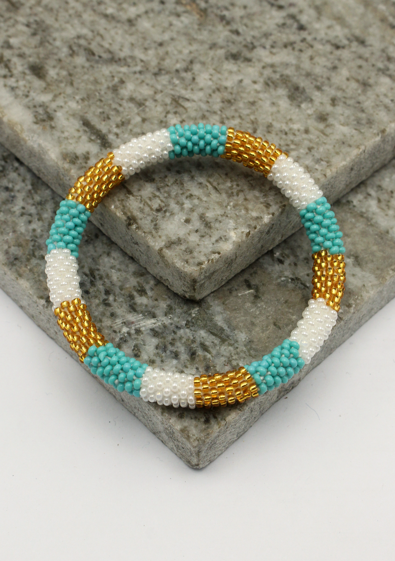 White Blue Gold Roll on Beads Bracelet