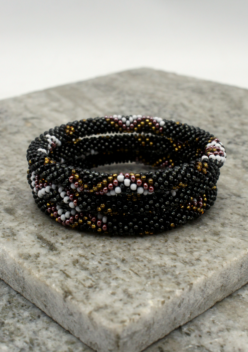 Golden Black Diamond Cut Roll on Beads Bracelet