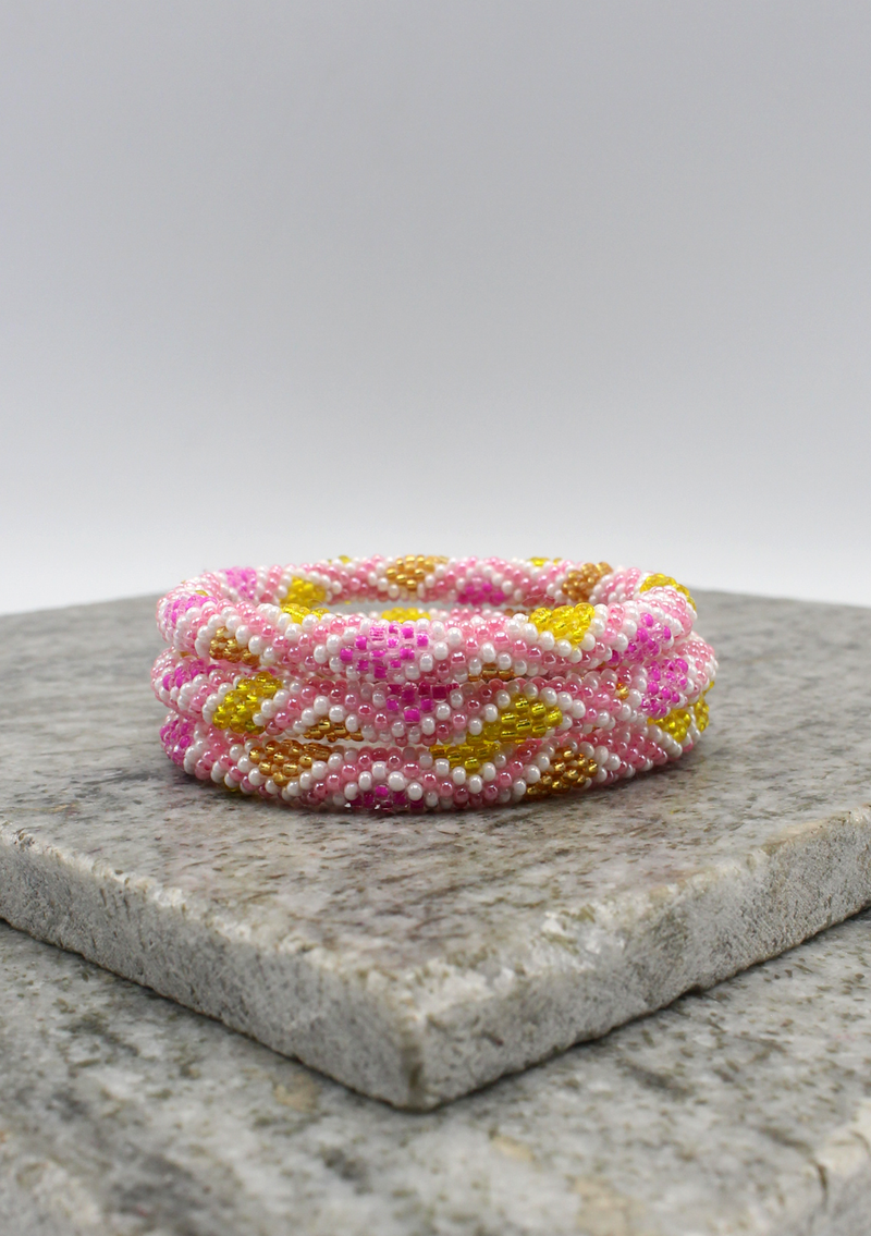 Gold Pink Nepalese Roll on Beads Bracelet