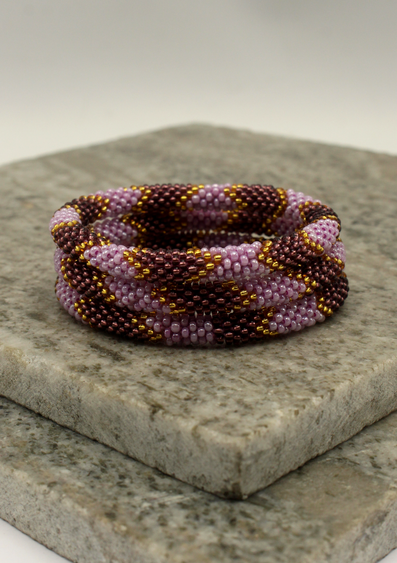 Golden Purple Roll on Beads Bracelet