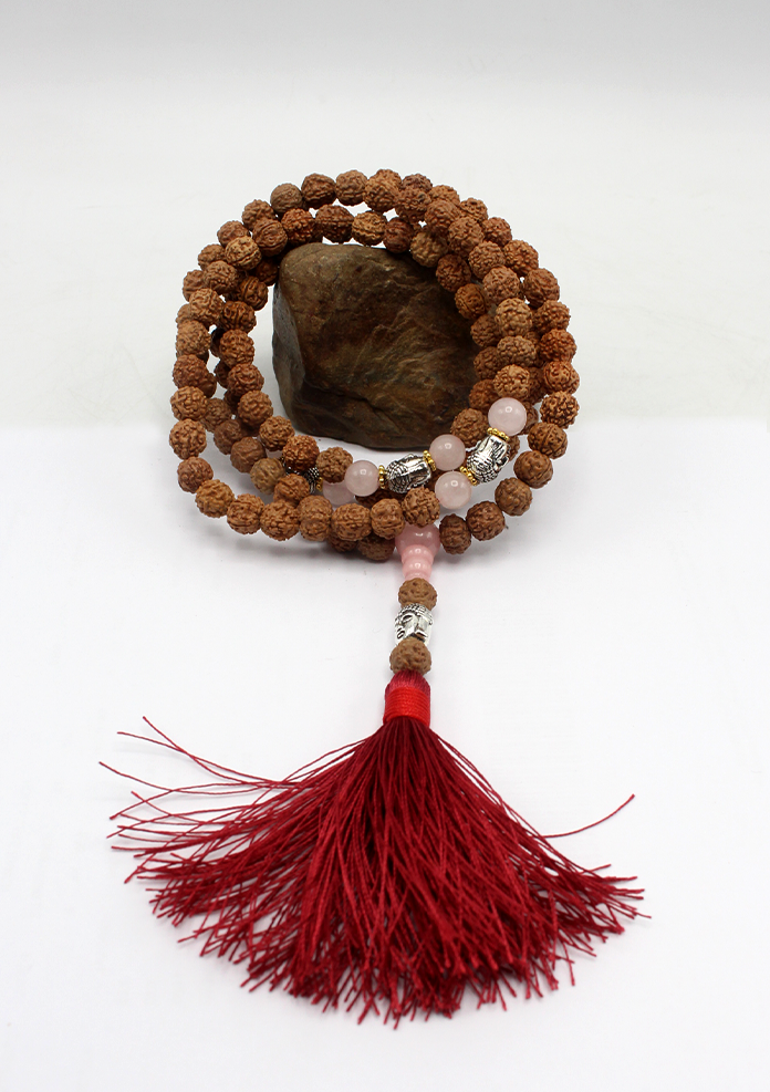 108 Rudraksha Mala with White Metal Buddha Spacer and Red Tassel