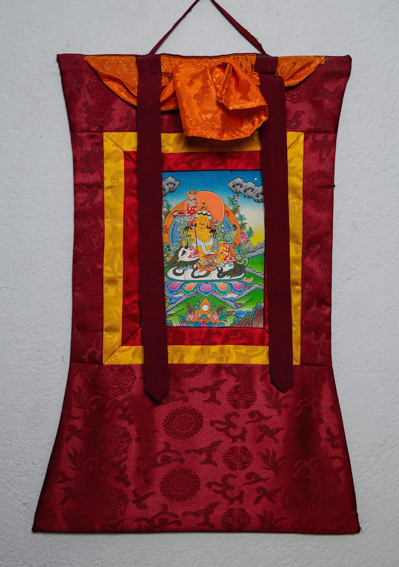 Yellow Dzambhala Thangka Painting with Brocade