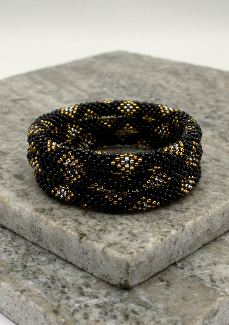 Golden Black Diamond Cut Roll on Beads Bracelet