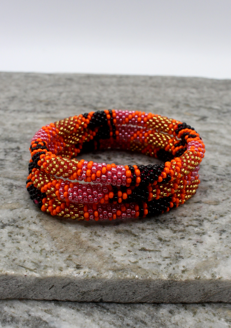 Black Orange Gold Spiral Nepalese Roll on Beads Bracelet