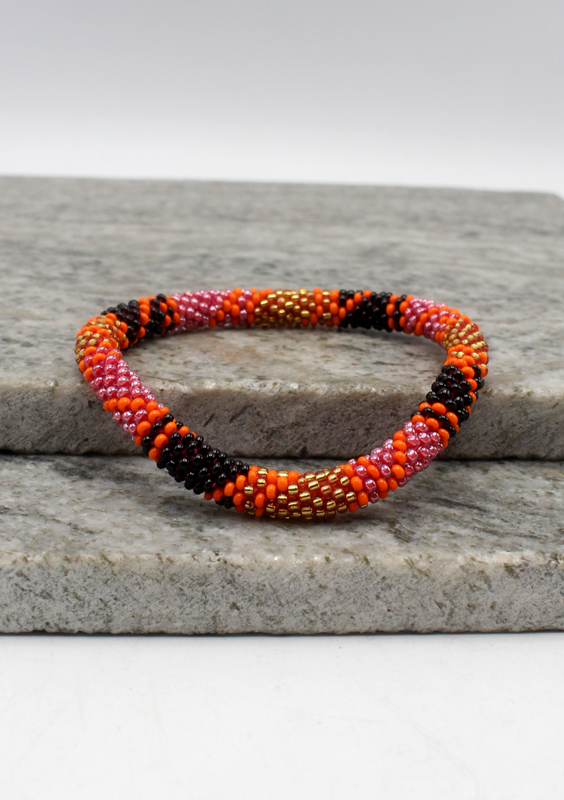 Black Orange Gold Spiral Nepalese Roll on Beads Bracelet