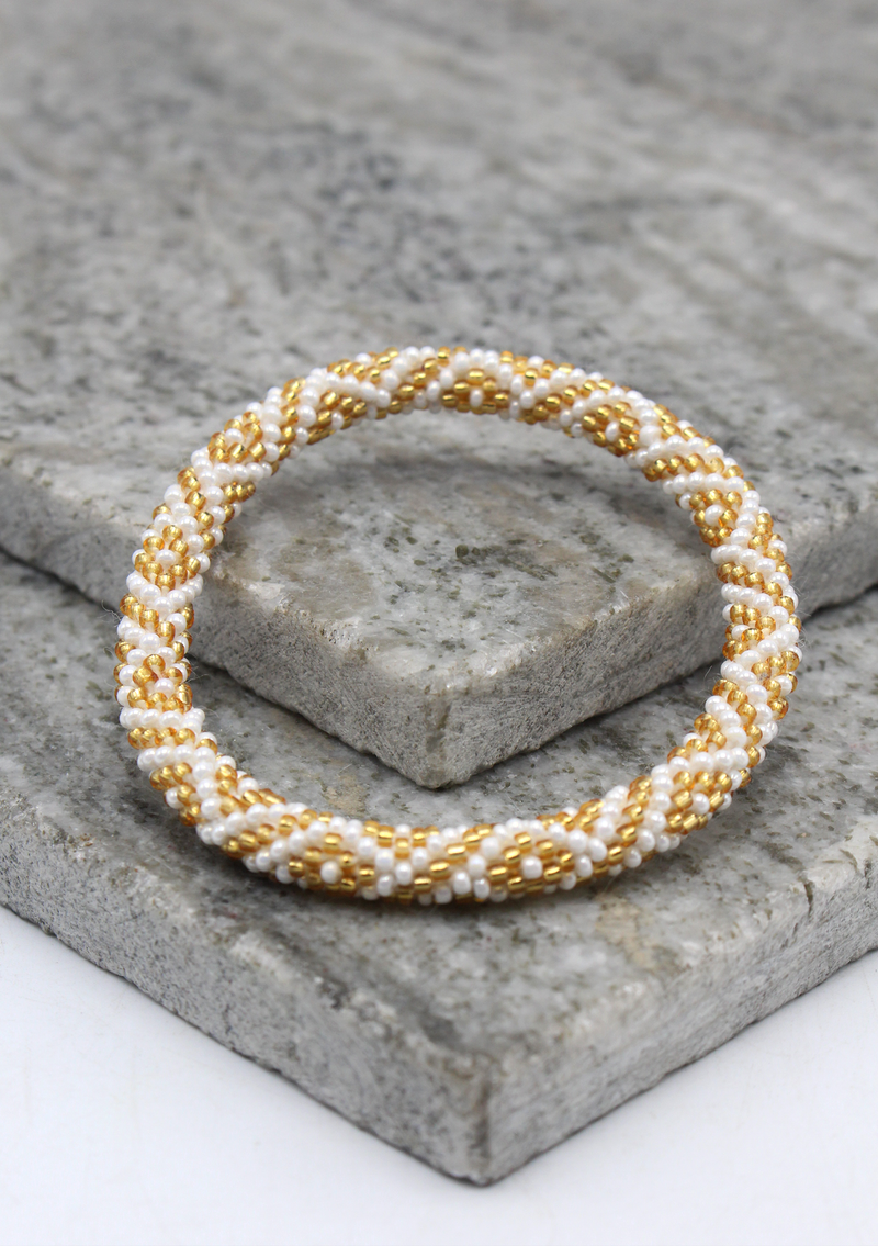 Nepalese Roll on Beads Golden White Diamond  Patterned Beads  Bracelet