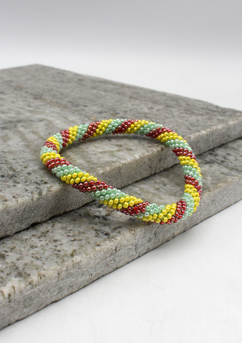 Mint Green  and Yellow Spiral Nepalese Roll on Beads Bracelet