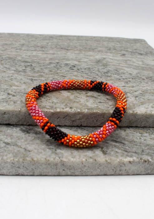 Black Orange Gold Spiral Nepalese Roll on Beads Bracelet