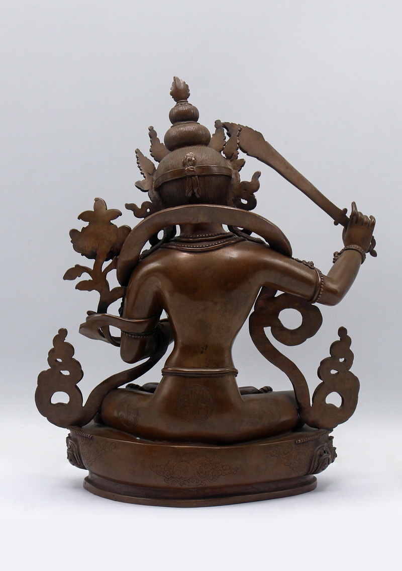 Masterfully Handcrafted Oxidized Copper Manjushri Statue – 11”