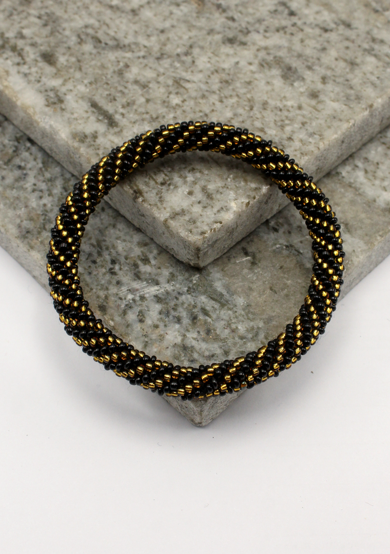 Golden Black Roll on Beads  Nepalese Bracelet