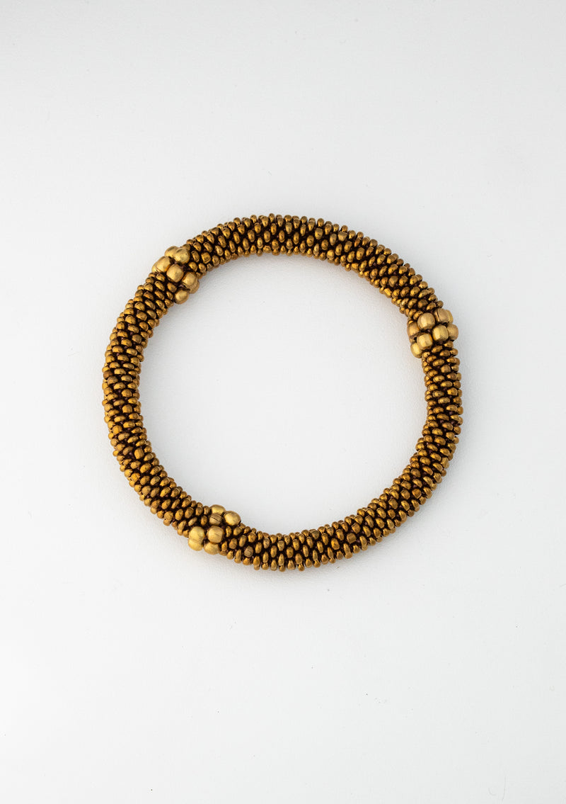 Golden Beads Nepalese Roll on Bracelet