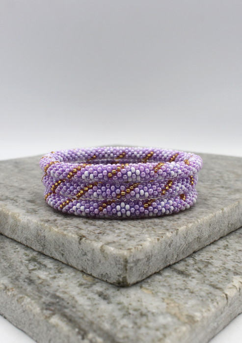 Light Purple Gold   Nepalese Roll on Beads Bracelet