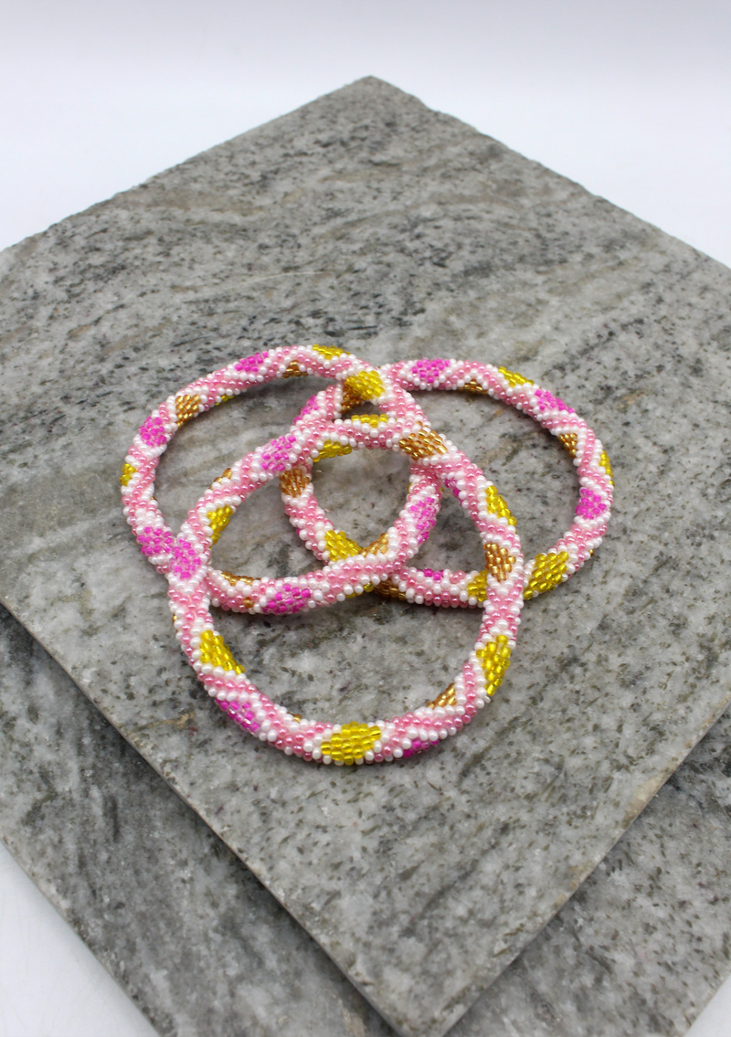 Gold Pink Nepalese Roll on Beads Bracelet