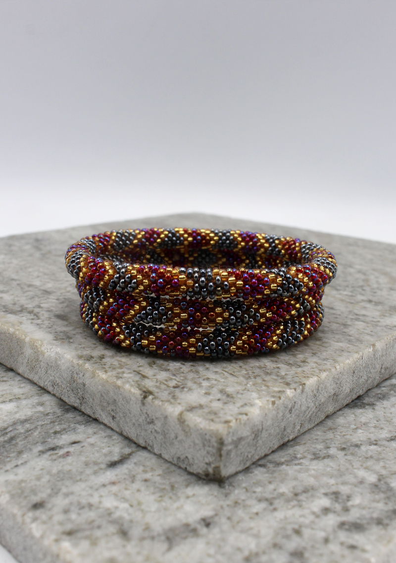 Dark Purple, Gold & Mixed Beads Nepalese Roll on Bracelet