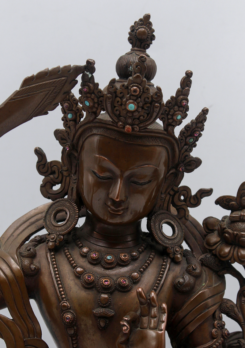 Masterfully Handcrafted Oxidized Copper Manjushri Statue – 11”