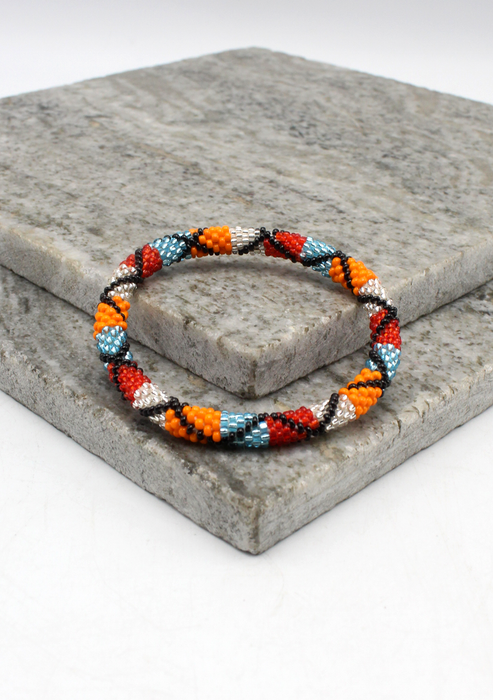 Orange Silver Red  Nepalese Roll on Beads Bracelet