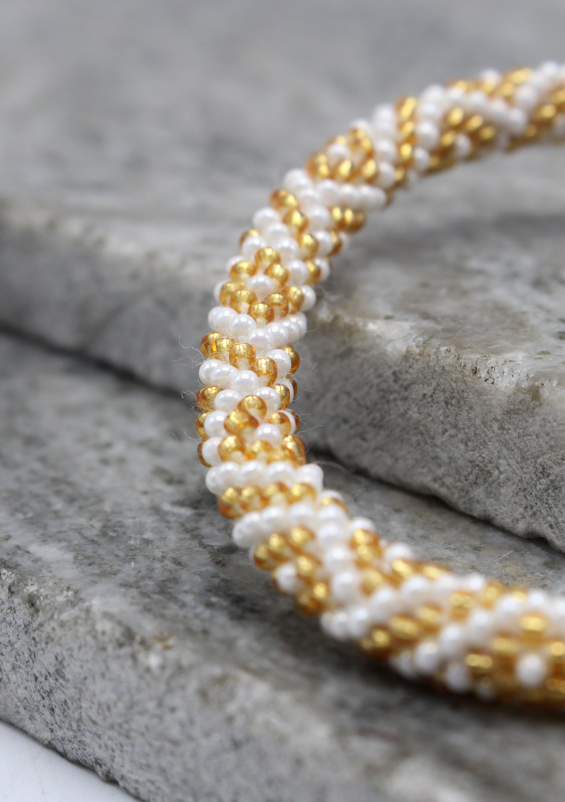 Nepalese Roll on Beads Golden White Diamond  Patterned Beads  Bracelet