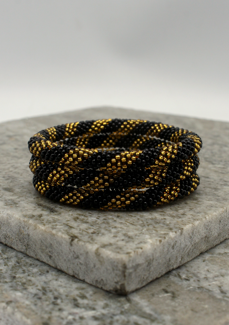 Black Gold Roll on Beads Bracelet