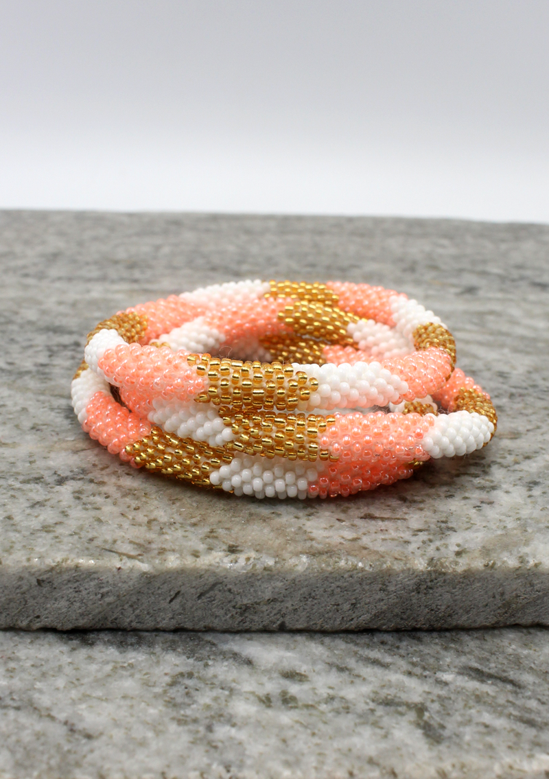 Baby Pink Three Stripe Nepalese Roll on Beads Bracelet