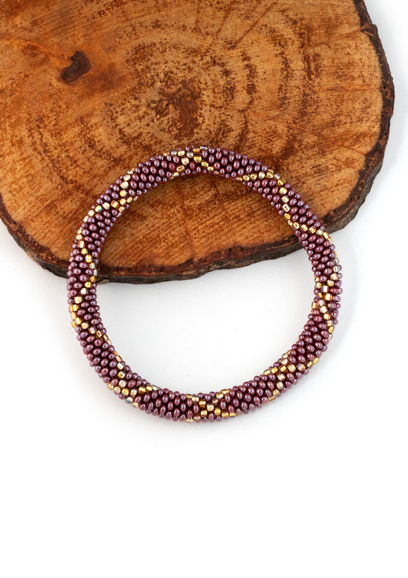 Deep Amethyst with Gold Nepalese Roll Bead Bracelet