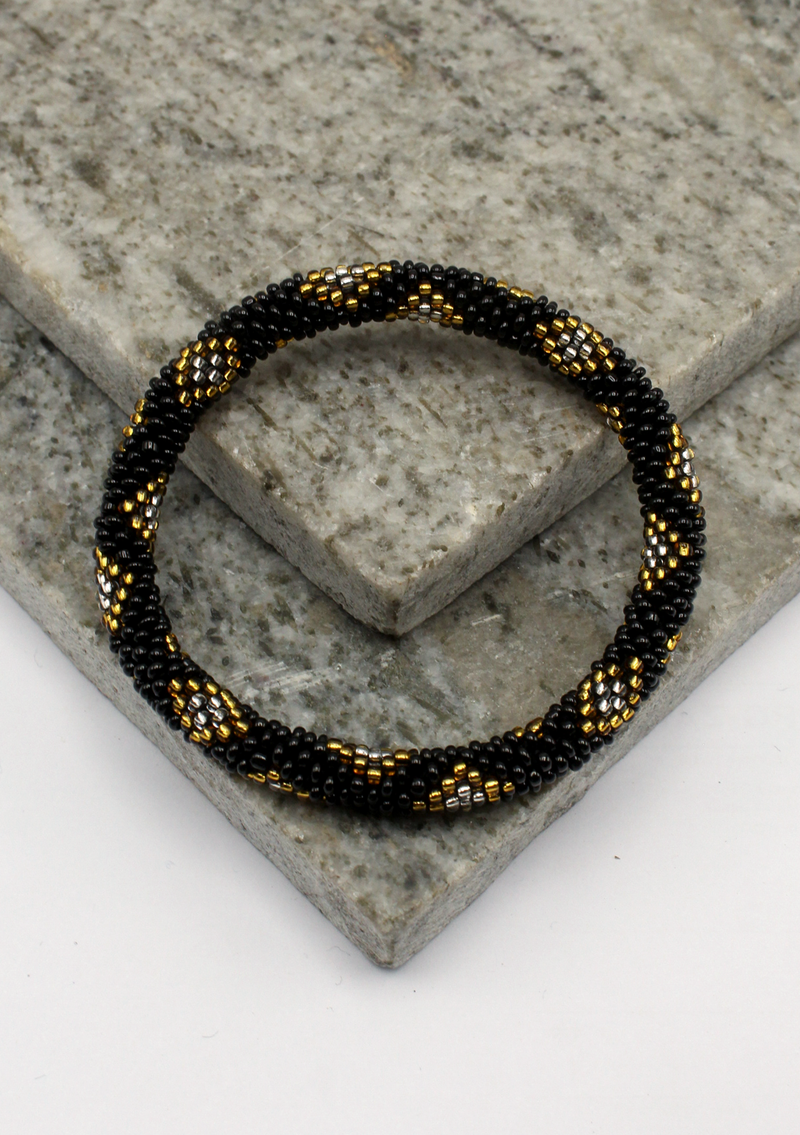 Golden Black Diamond Cut Roll on Beads Bracelet
