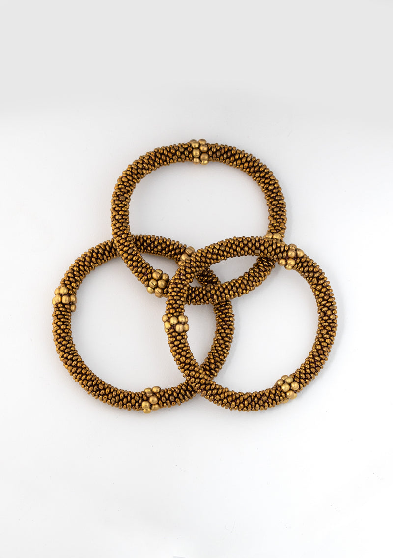 Golden Beads Nepalese Roll on Bracelet