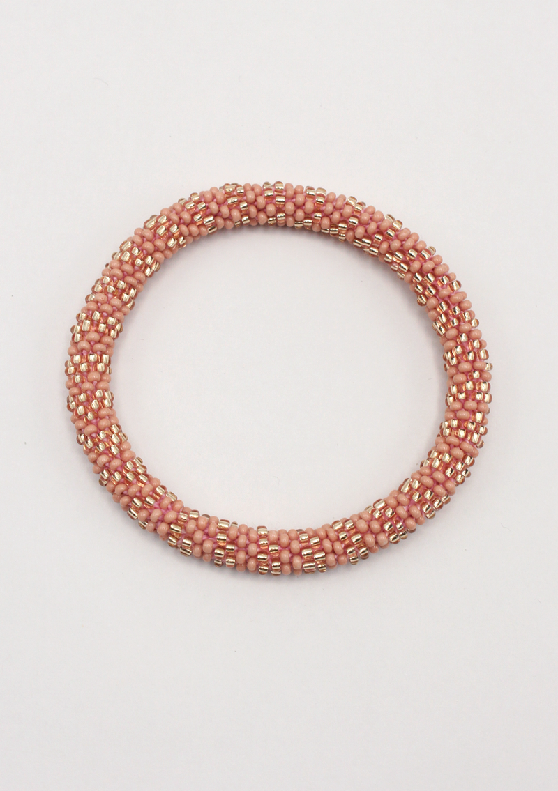 Pink Gold Roll on Beads Nepalese Bracelet