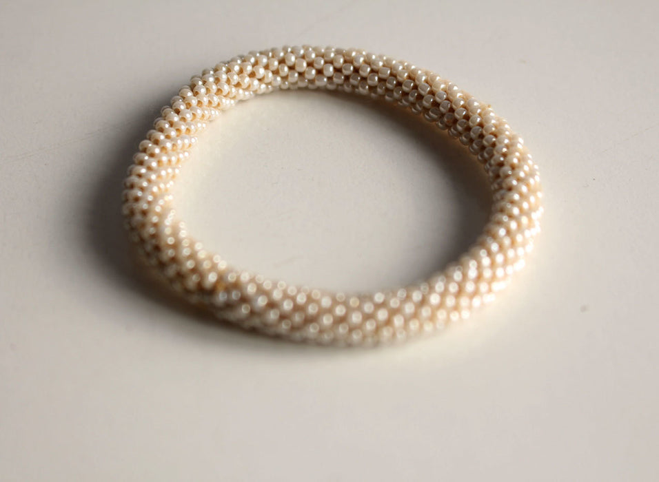 Plain Beige Crocheted Beads Roll On Bracelet