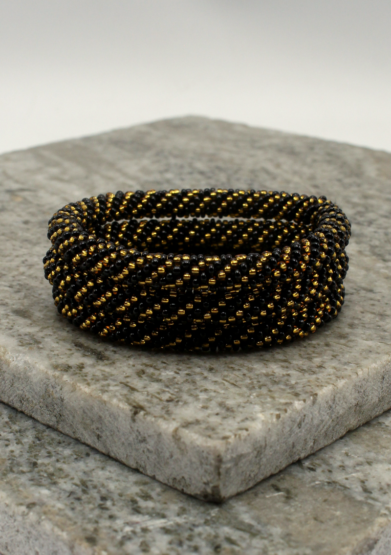 Golden Black Roll on Beads  Nepalese Bracelet