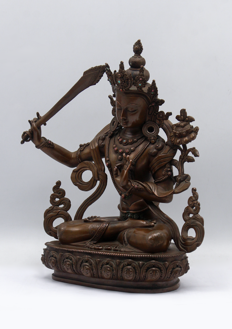 Masterfully Handcrafted Oxidized Copper Manjushri Statue – 11”