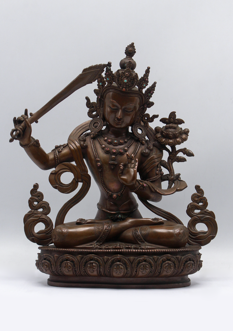 Masterfully Handcrafted Oxidized Copper Manjushri Statue – 11”