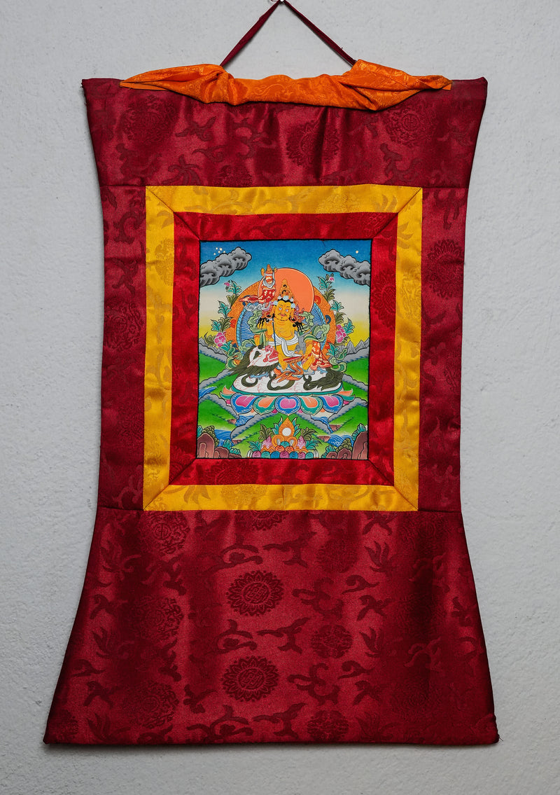 Yellow Dzambhala Thangka Painting with Brocade