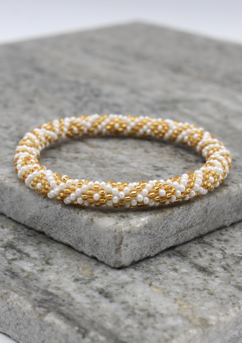 Nepalese Roll on Beads Golden White Diamond  Patterned Beads  Bracelet
