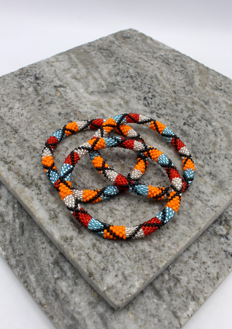 Orange Silver Red  Nepalese Roll on Beads Bracelet