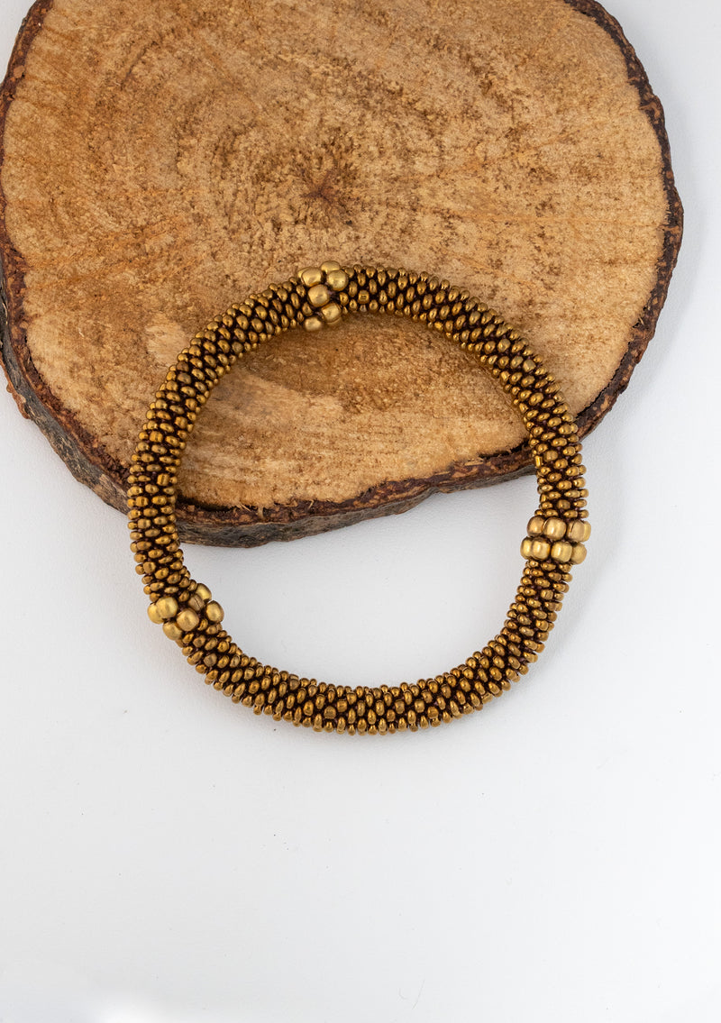 Golden Beads Nepalese Roll on Bracelet