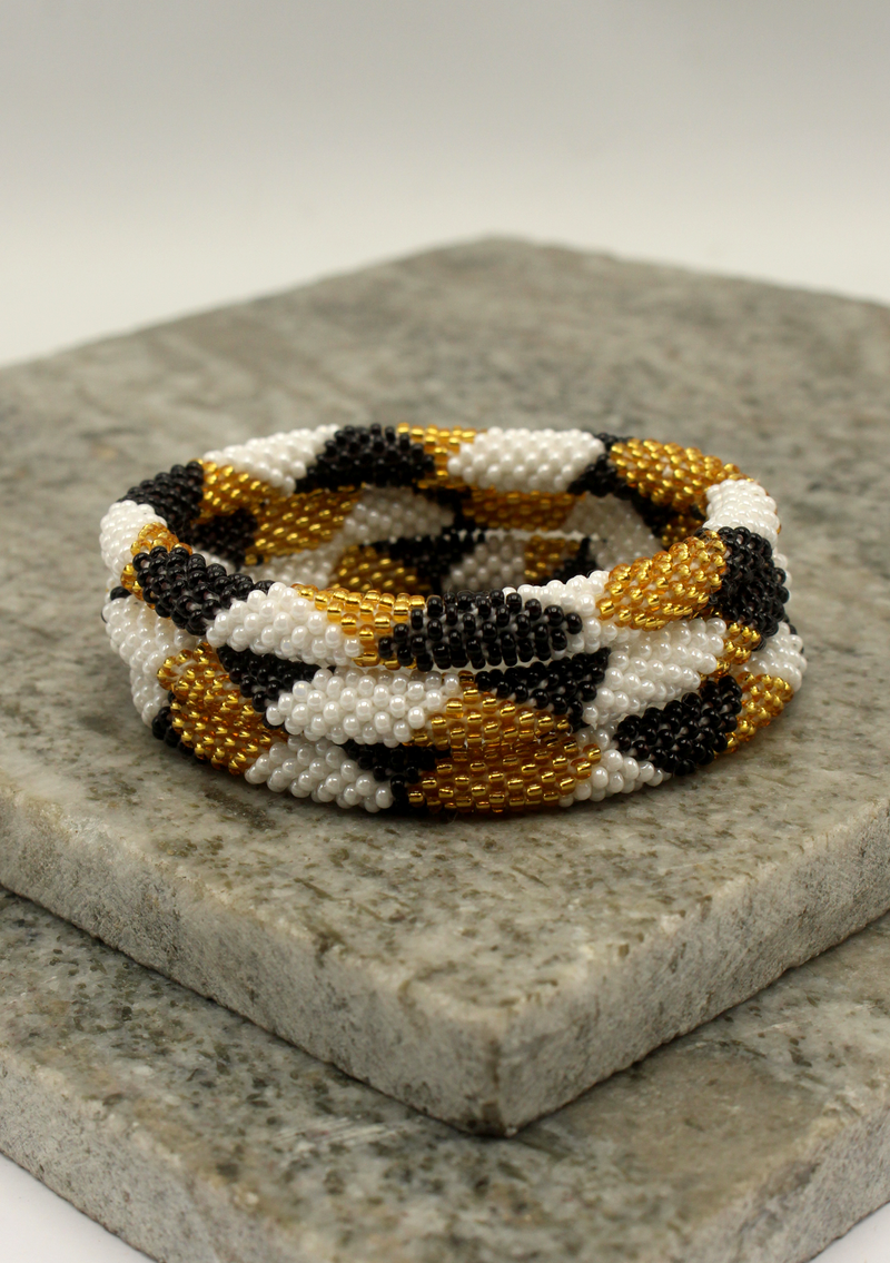 Black Burfi Golden White Beads Bracelet